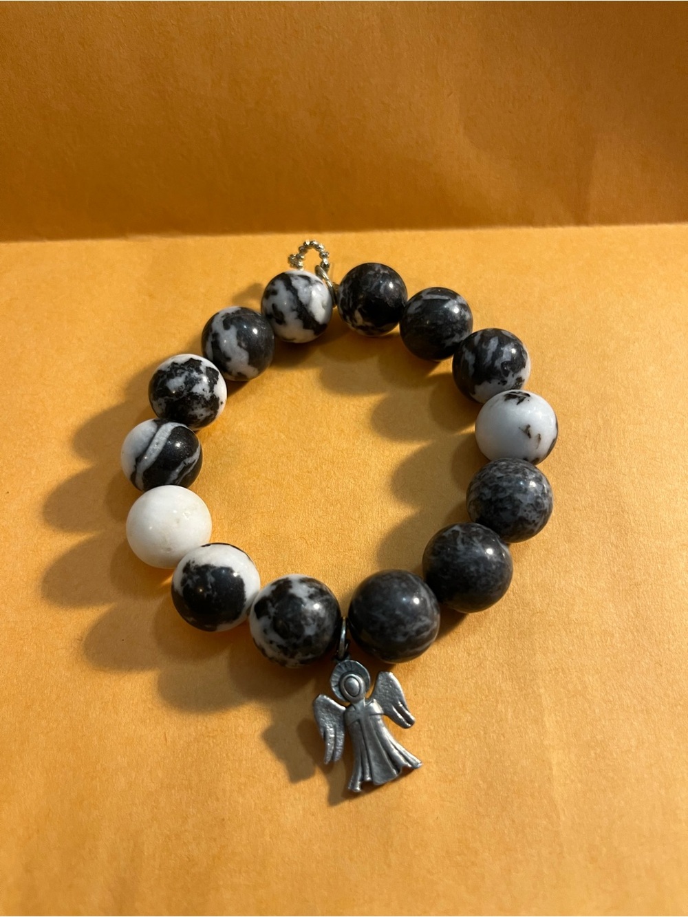 Black and White Marble Jasper Bead Bracelet with Angel Charm